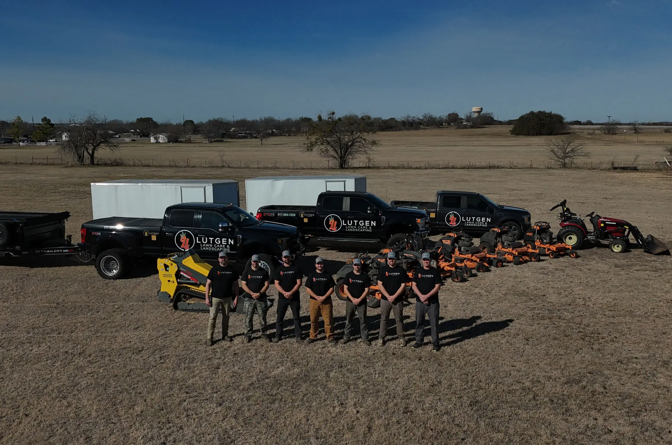 Lutgen crew and commercial lawn-care equipment ready for larger properties
